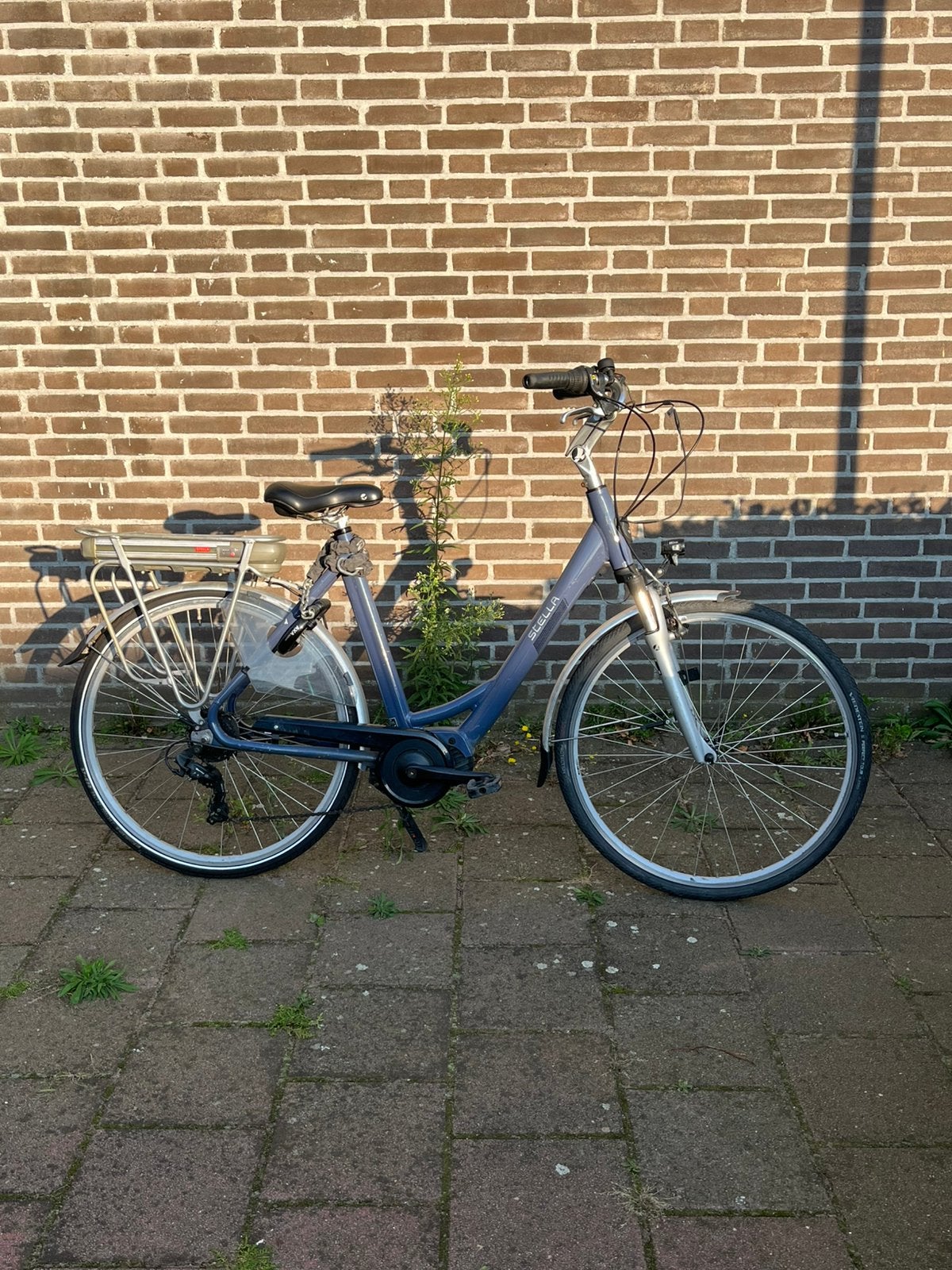 Middenmotor elektrische fiets Stella Allegra, Zo goed als nieuw, 59 cm of meer, 50 km per accu of meer, Ophalen