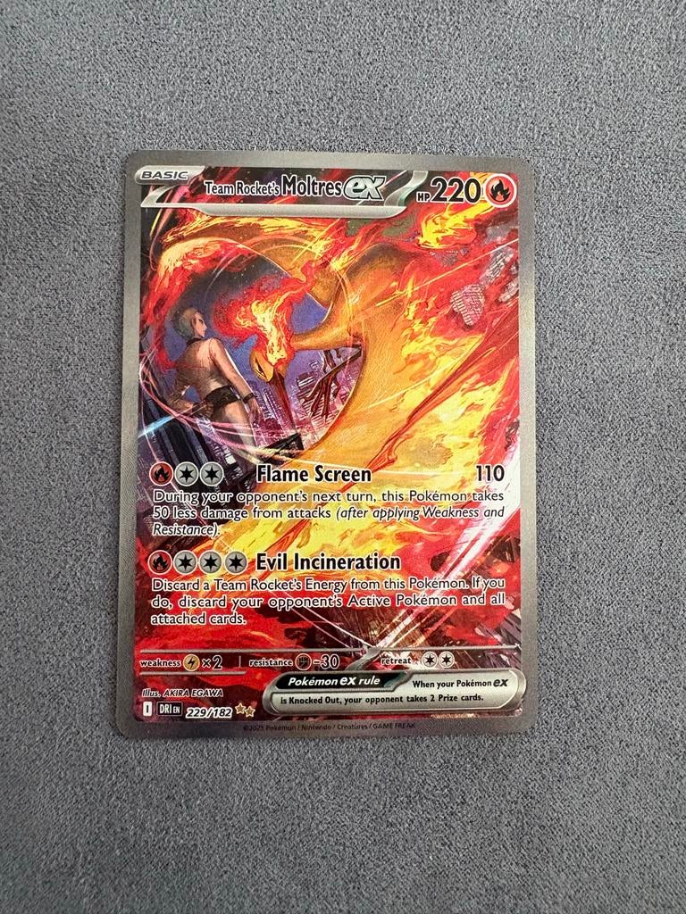 Team Rocket's Moltres ex 220/182 - Obsidian Flames, Ophalen of Verzenden, Zo goed als nieuw, Losse kaart