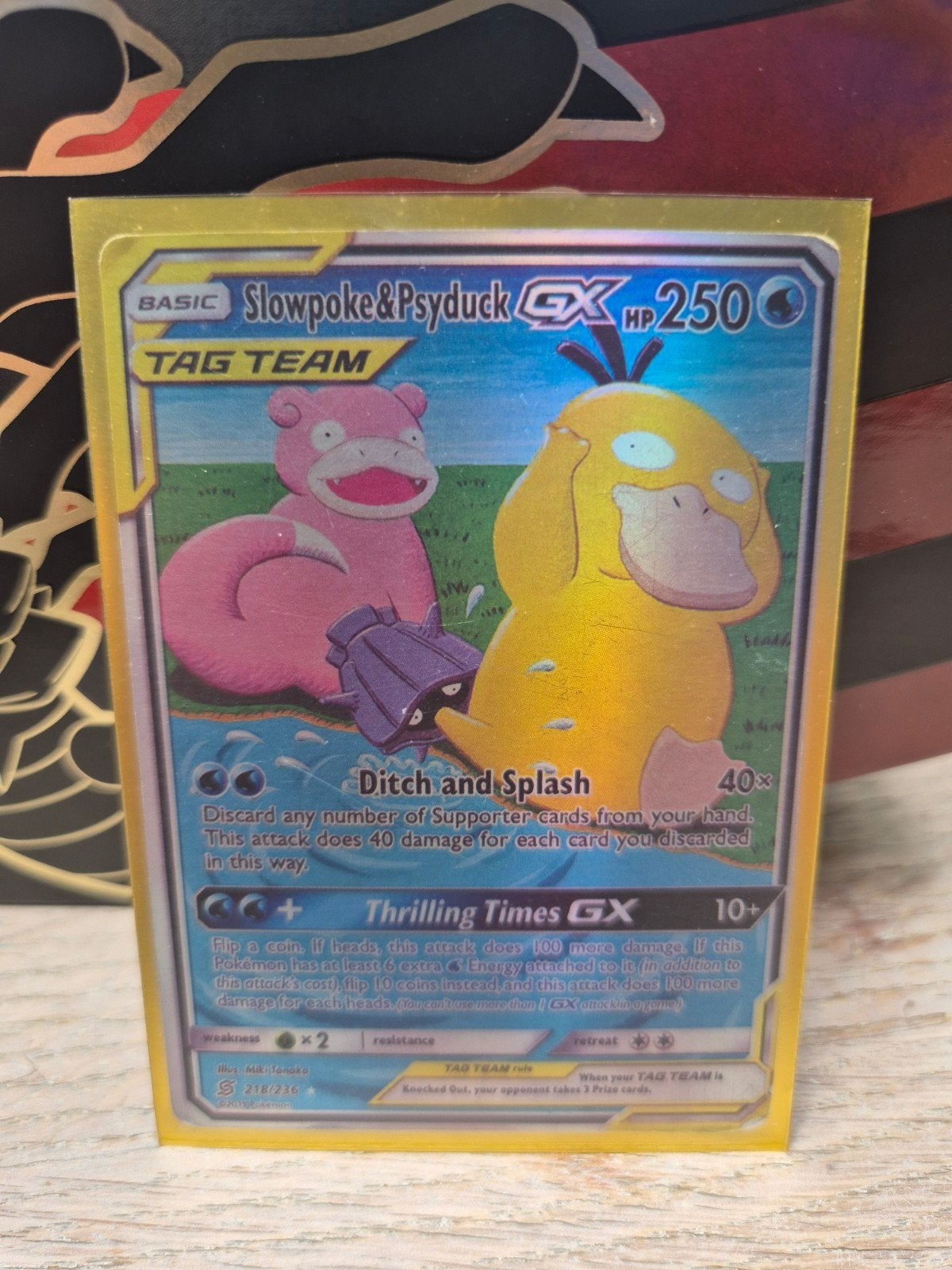 Pokémon Slowpoke & Psyduck GX TAG TEAM - Beschadigd, Ophalen of Verzenden, Zo goed als nieuw, Losse kaart, Foil