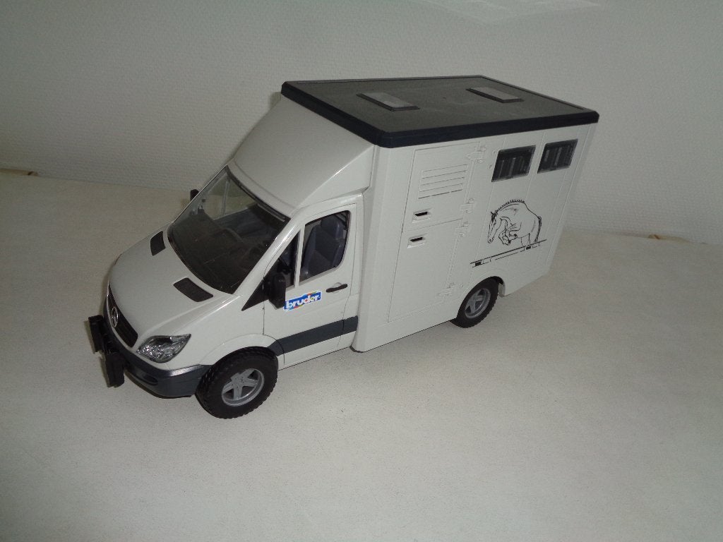 Bruder Paarden transporter. Veewagen. Met 2 paarden., Ophalen of Verzenden, Zo goed als nieuw