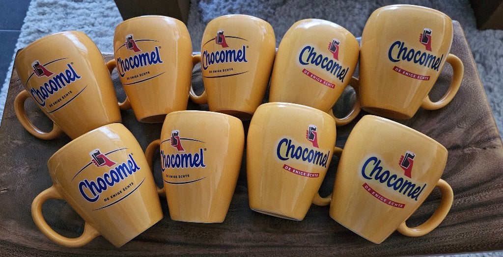 9 Chocomel bekers 'de enige echte' nieuw, gaaf & ongebruikt!, Nieuw, Ophalen of Verzenden, Overige stijlen, Kop(pen) en/of Schotel(s)