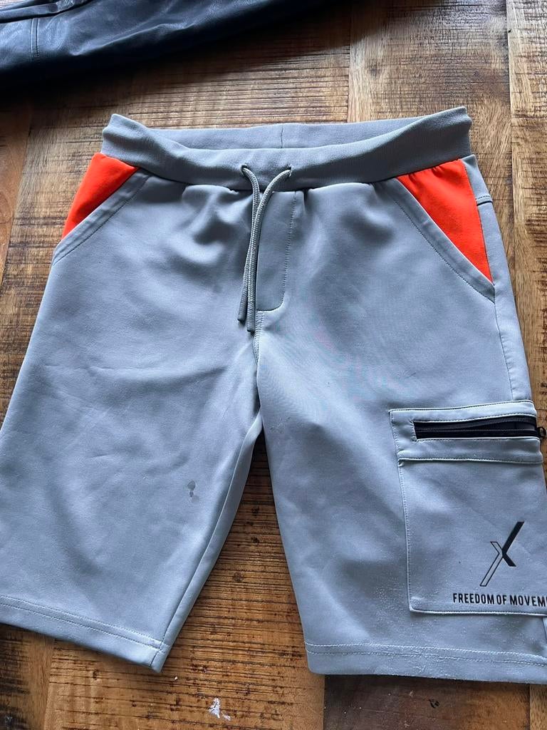 Grijze sportshort Retour maat 15/16, Ophalen of Verzenden, Gebruikt, Jongen, Broek