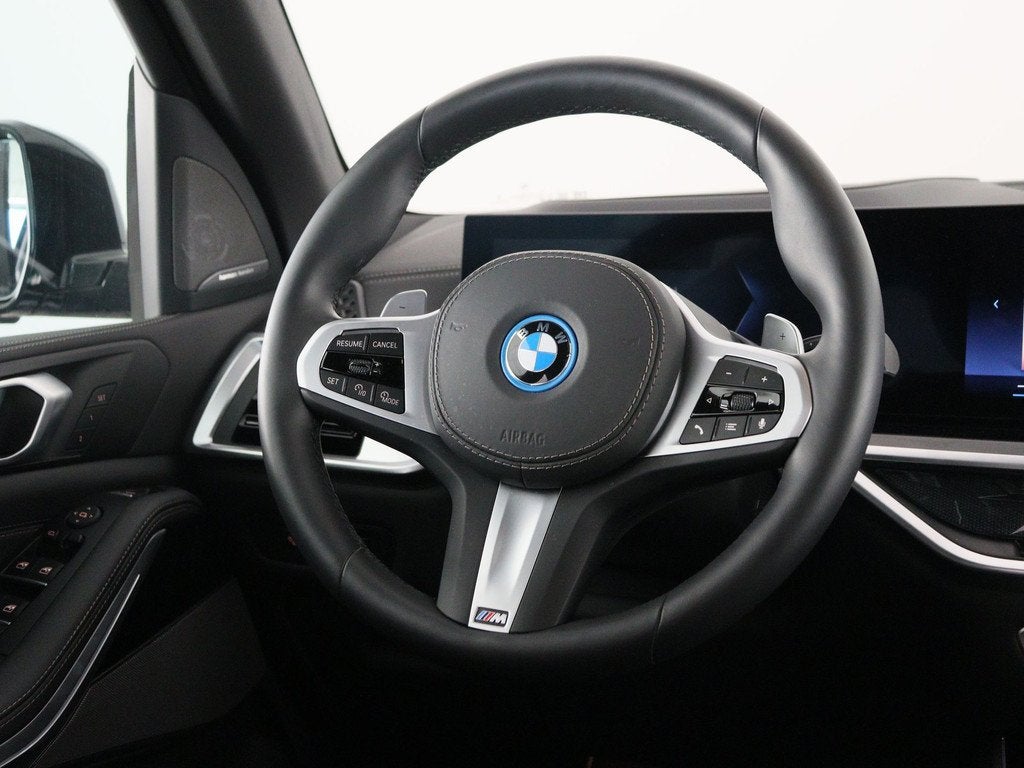 BMW X5 xDrive50e (bj 2025, automaat), Auto's, Gebruikt, 2395 kg, Met garantie (alle), Blauw