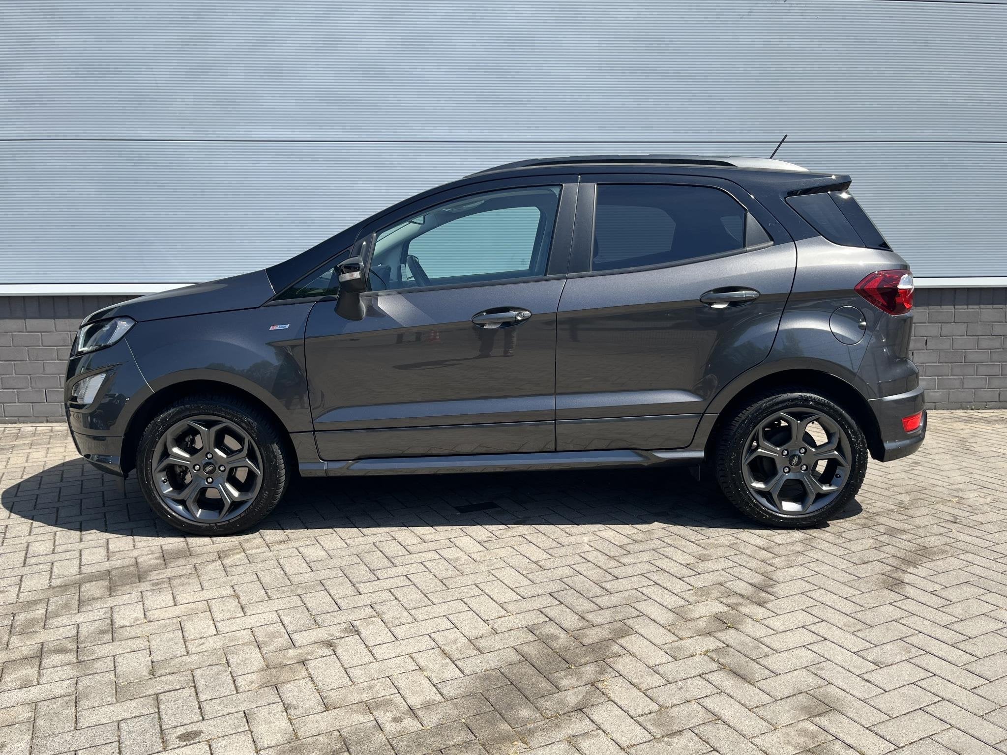 Ford EcoSport 1.0 125 pk automaat ST-Line Black Dealer onder, Auto's, 125 pk, Gebruikt, Ecosport, Leder en Stof