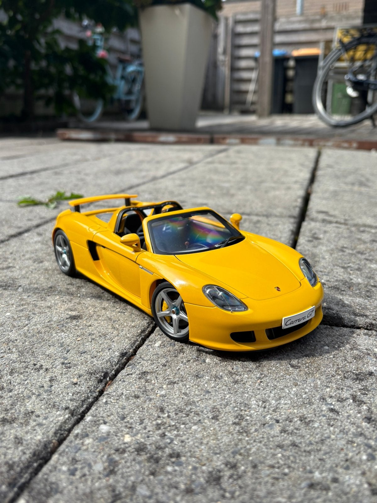 1:18 Autoart porsche carrera gt giallo nieuw in doos, Ophalen of Verzenden, Nieuw, Autoart
