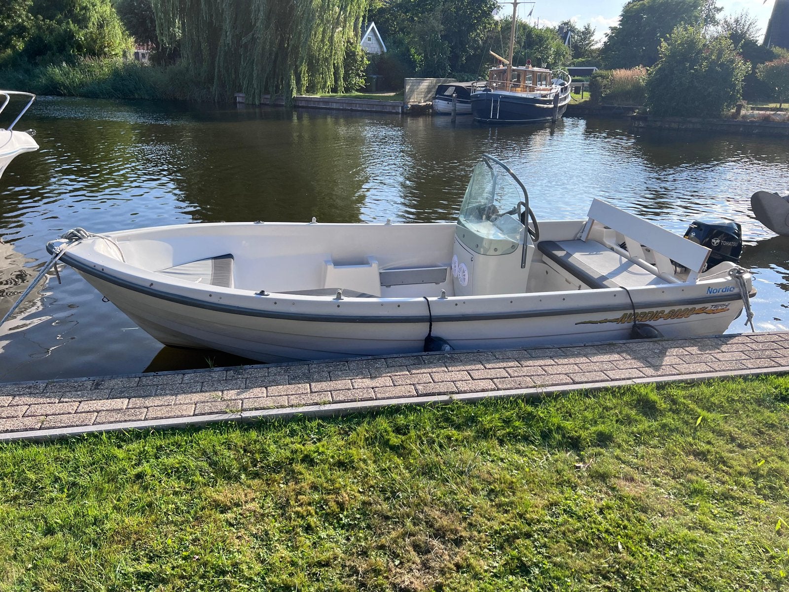 Terhi nordic 6020 incl. trailer en 9.8pk buitenboordmotor, Ophalen, Benzine, Buitenboordmotor, Trailer