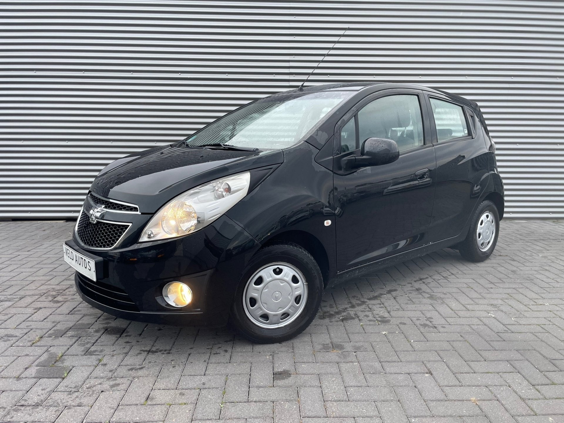 Chevrolet Spark 1.0 16V LT bouwjaar 2012 met 86665 km, Voorwielaandrijving, 839 kg, Stof, Gebruikt