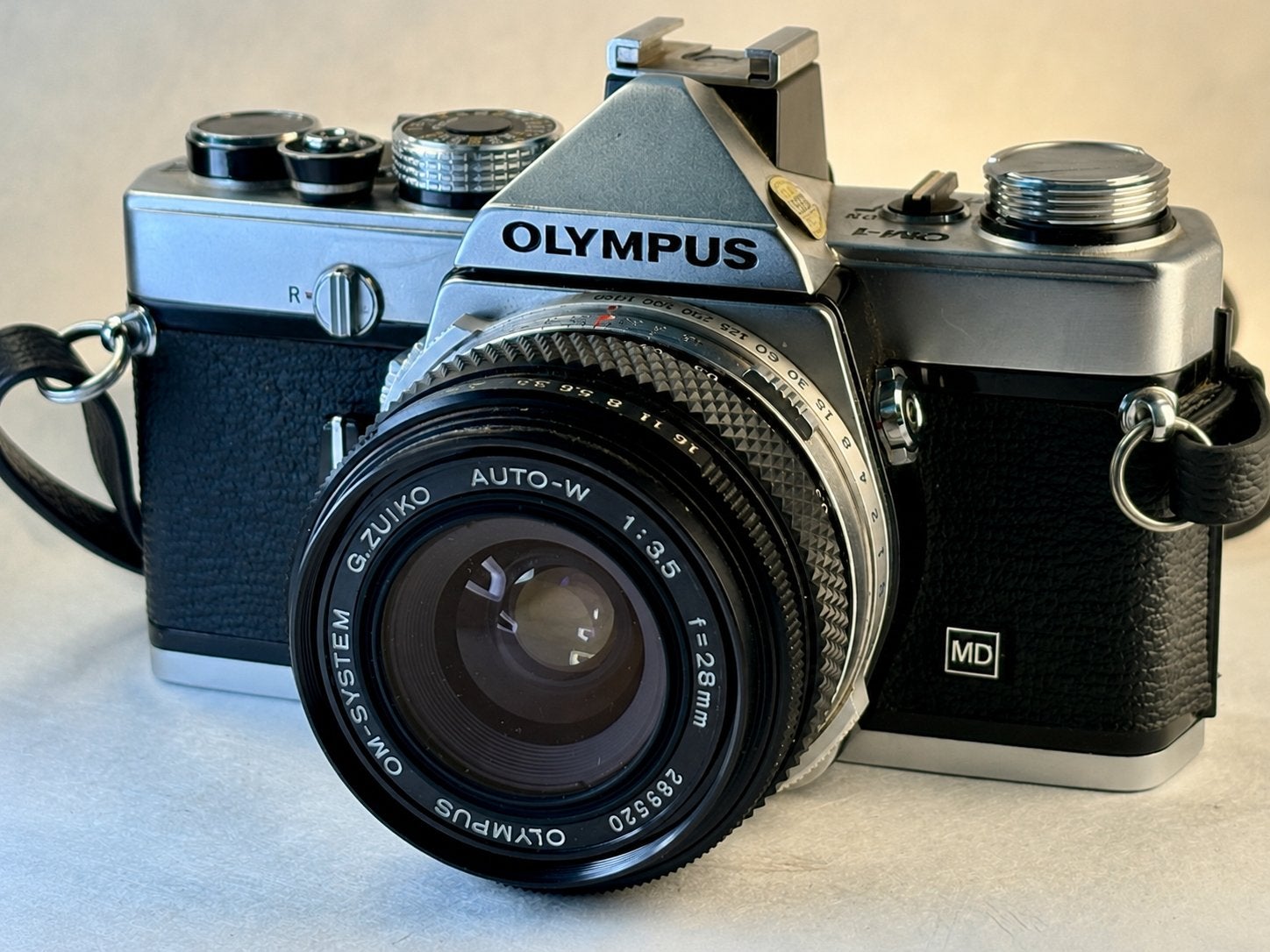 Olympus OM-1 + Zuiko 28mm f/3.5 | Werkend, Ophalen of Verzenden, Zo goed als nieuw, Spiegelreflex, Olympus
