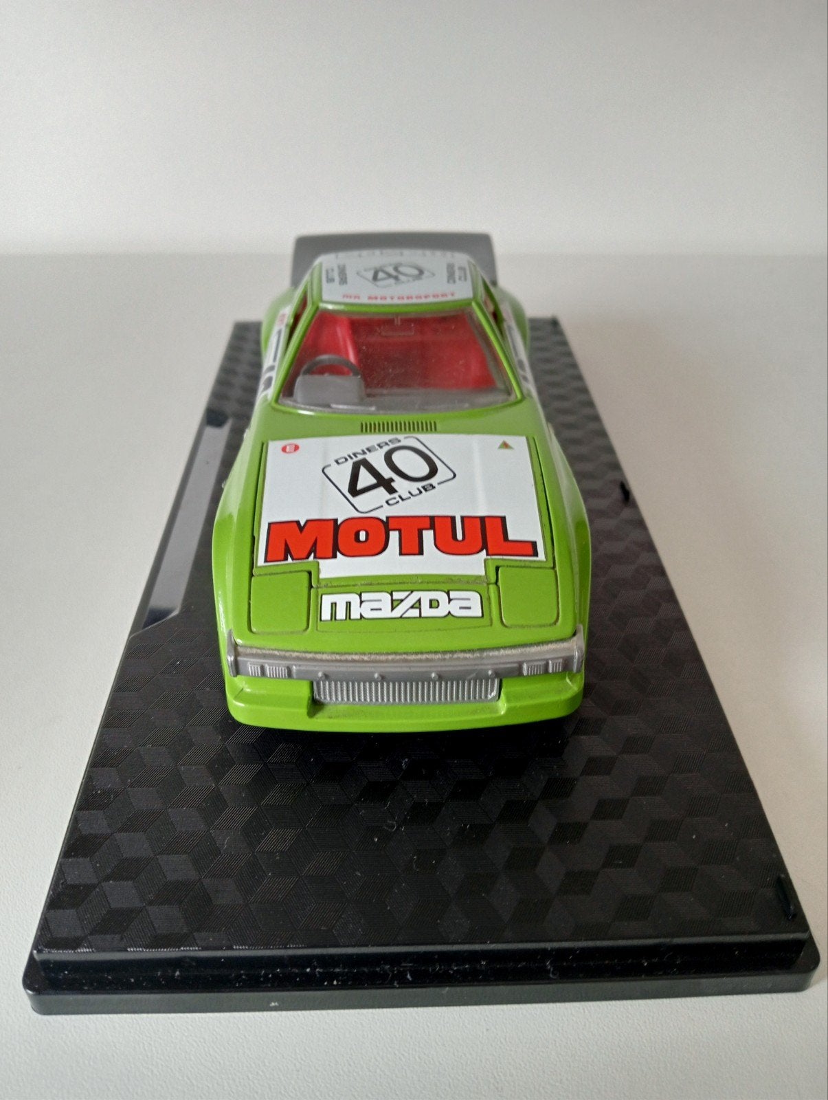 Mazda RX-7 Motul #40 schaalmodel  1:24- Groen zeldzaam., Ophalen of Verzenden, Nieuw, Auto, Bburago