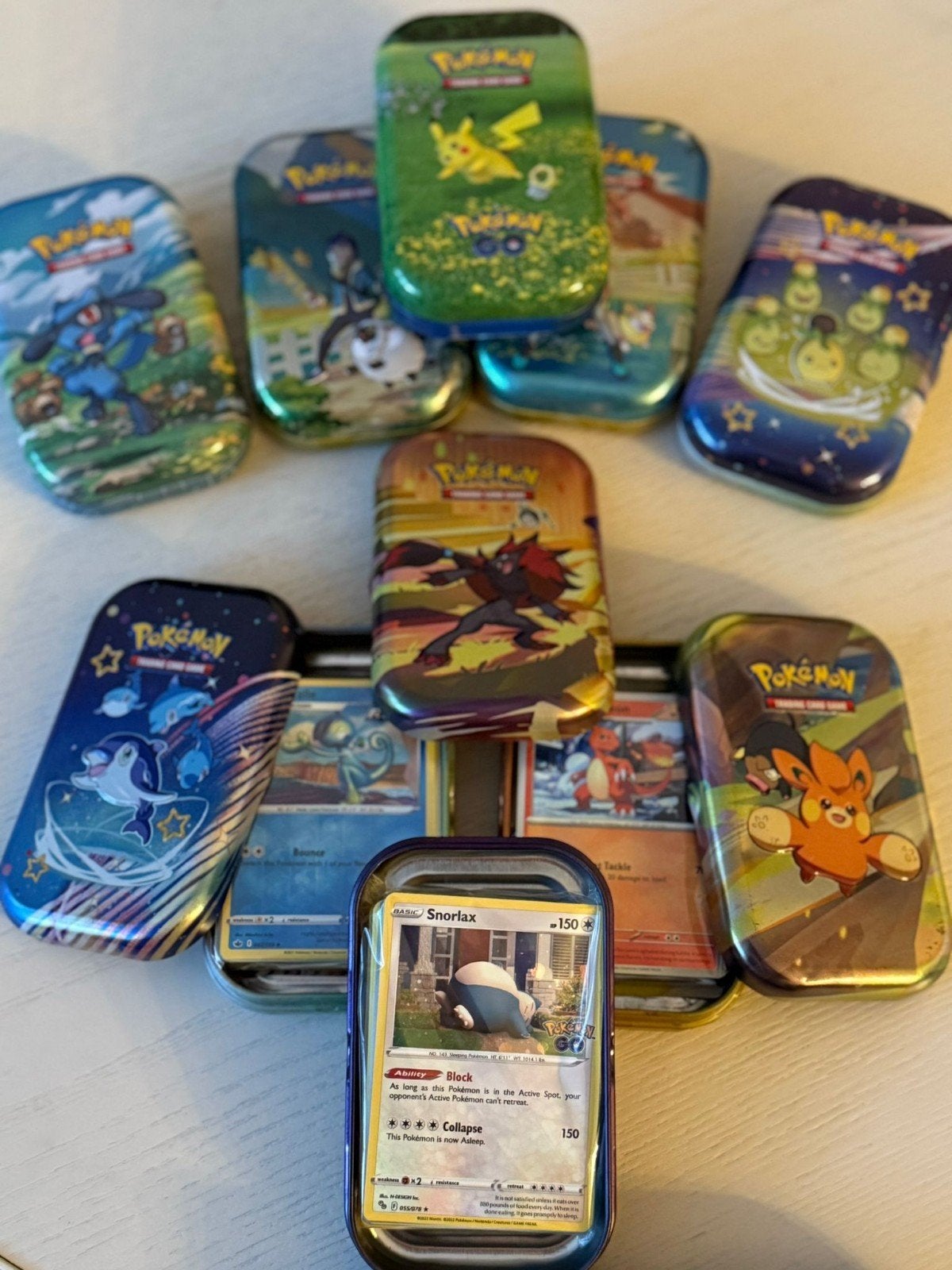 Mini tin met 50 Pokemonkaarten, Ophalen of Verzenden, Zo goed als nieuw, Meerdere kaarten, Foil