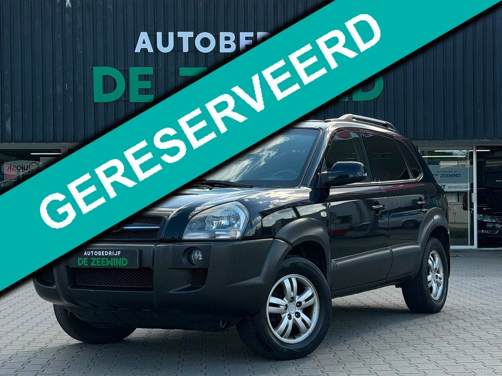 Hyundai Tucson 2.0i Style World Cup edition|leer|trekhaak|Ri, Auto's, Hyundai, Gebruikt, 4 cilinders, Zwart, Handgeschakeld