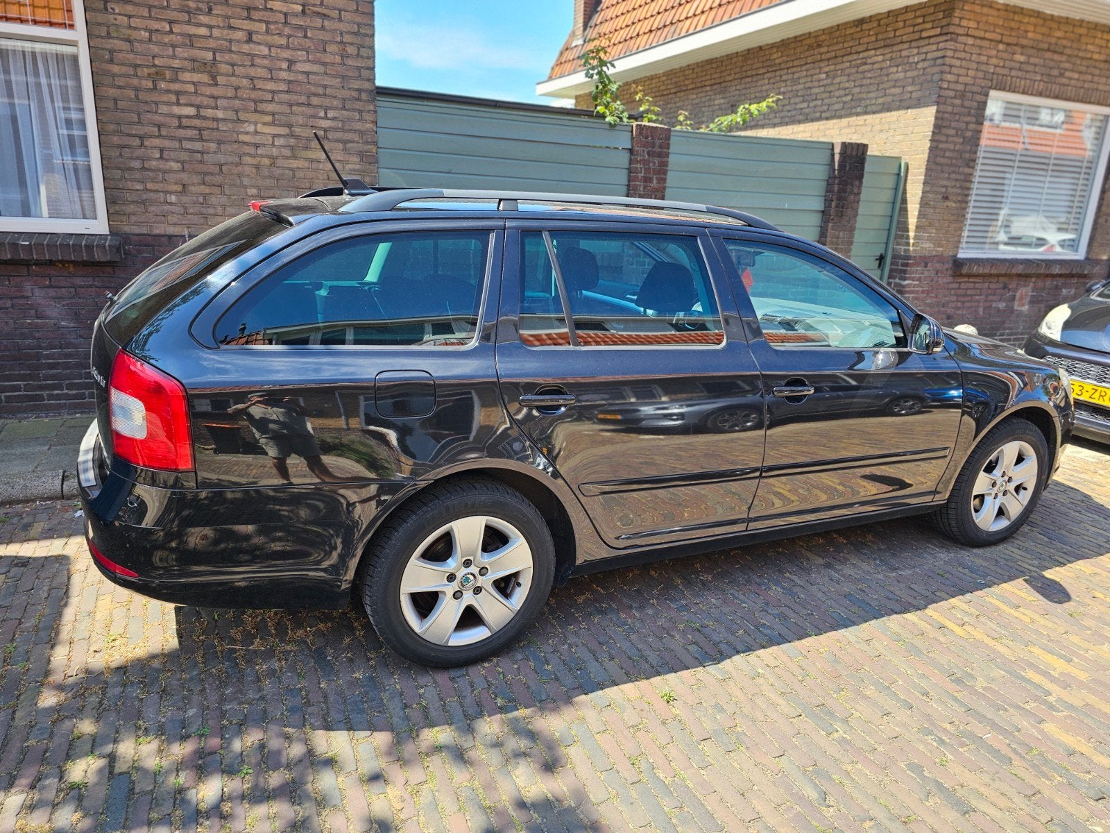 Skoda Octavia 1.8 TSI 118KW Combi 2011 Zwart, Auto's, Skoda, Voorwielaandrijving, Stof, 4 cilinders, 160 pk