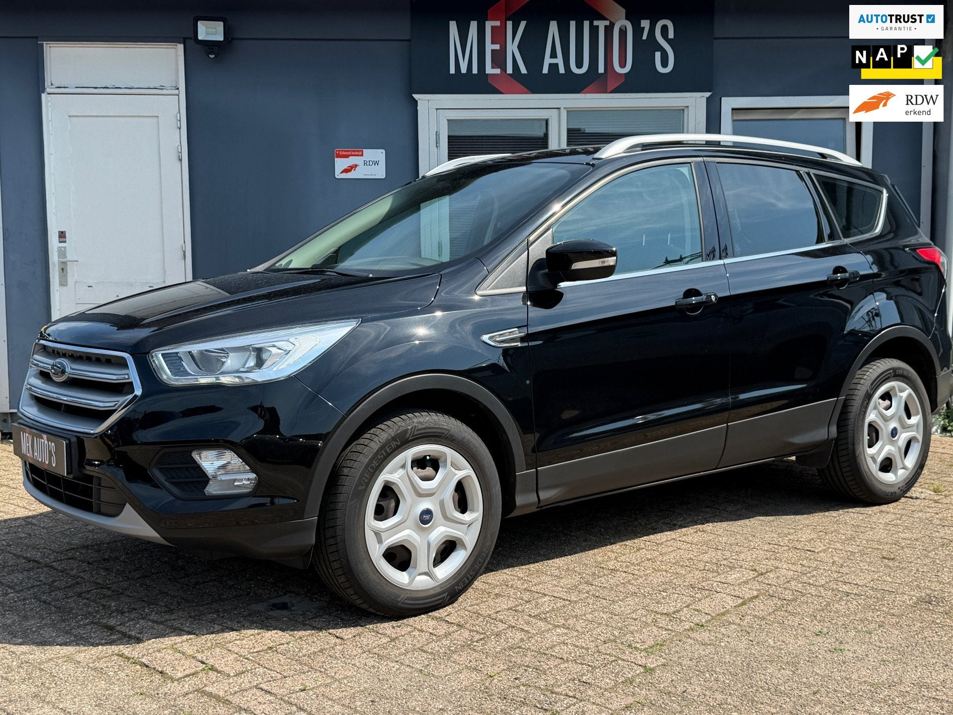 Ford Kuga 1.5 EcoBoost Trend Ultimate|Navi|Cruise|Climate|Na, Auto's, Dealer onderhouden, Stof, Zwart, Origineel Nederlands