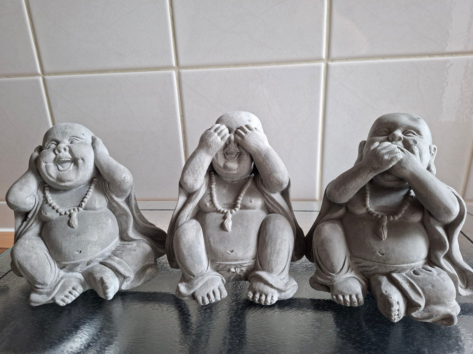Boeddha beeldjes, Horen Zien en Zwijgen., Ophalen