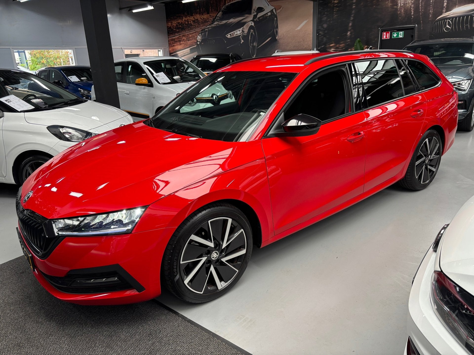 Skoda Octavia Combi 1.0 TSI Sport Business / Navigatie, Dealer onderhouden, Stof, Gebruikt, Met garantie (alle)