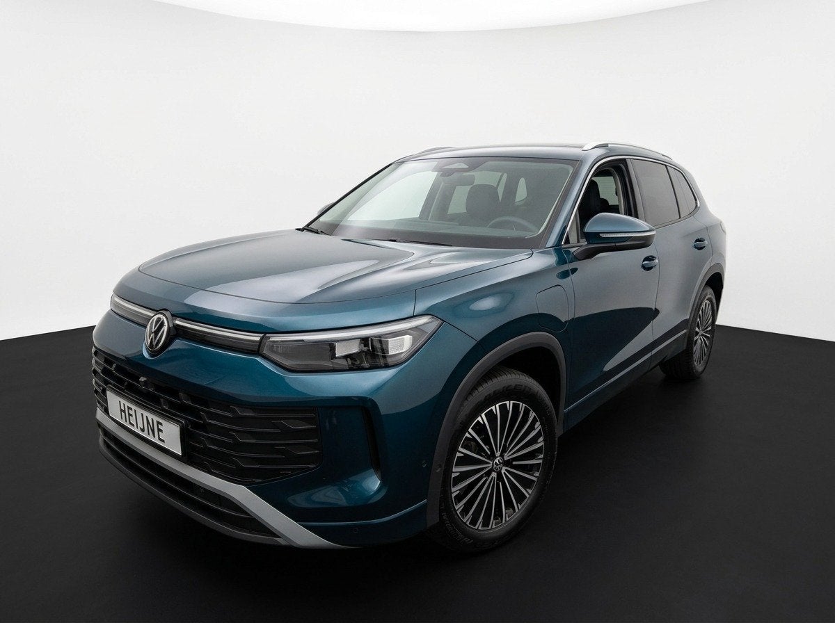 Volkswagen Tayron 1.5 204PK eHybrid DSG LIFE 360°CAMERA/TRE, Auto's, 12 maanden, 4 cilinders, Blauw, Bedrijf
