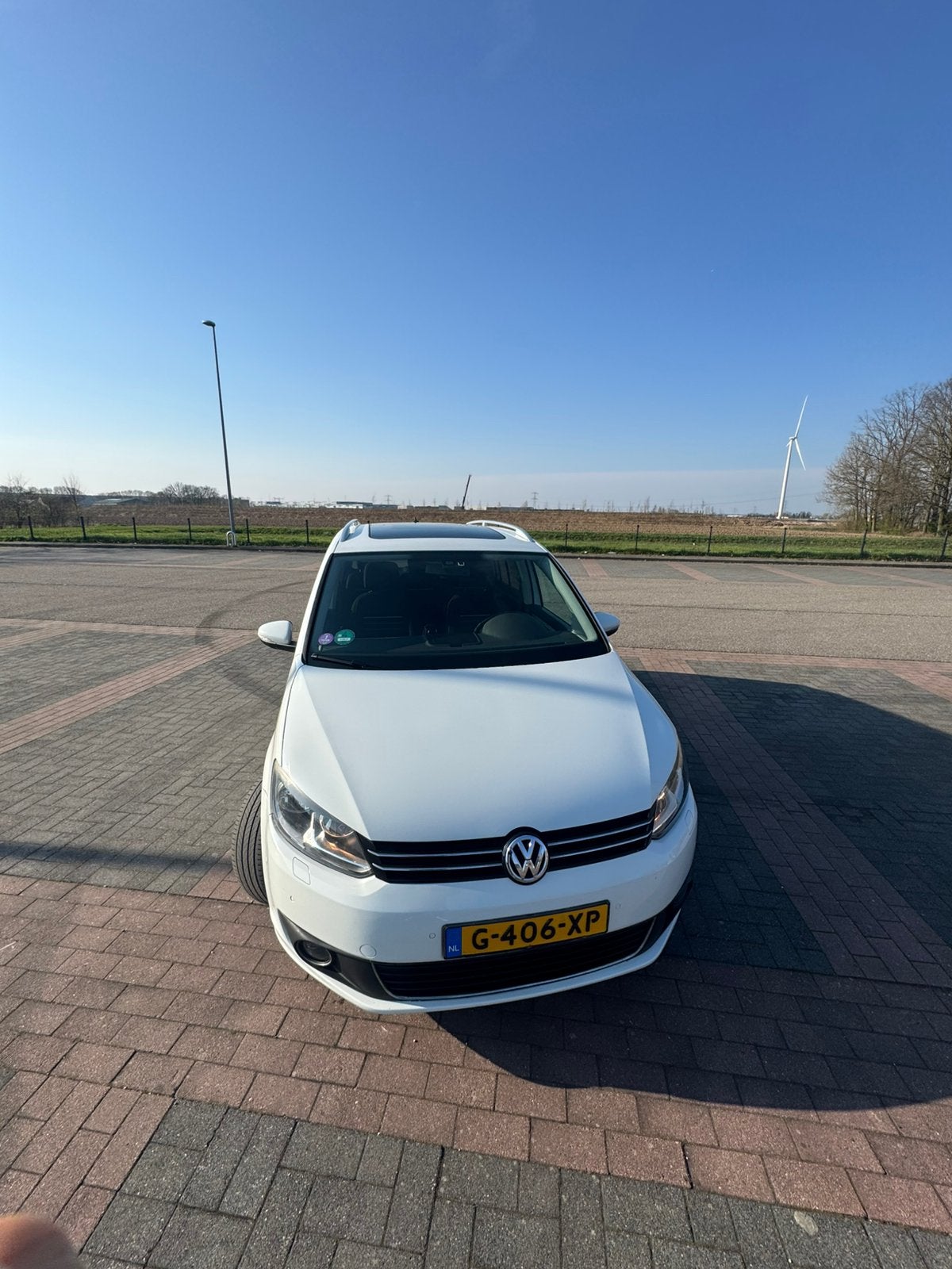 Volkswagen Touran 1.2 TSI CUP 77KW BMT 7P PANO 2014 Wit, Auto's, Volkswagen, Voorwielaandrijving, Zwart, 4 cilinders, 7 stoelen