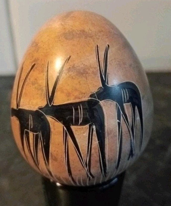 Stone Egg Handgesneden en beschilderd Afrikaanse krijger, Ophalen