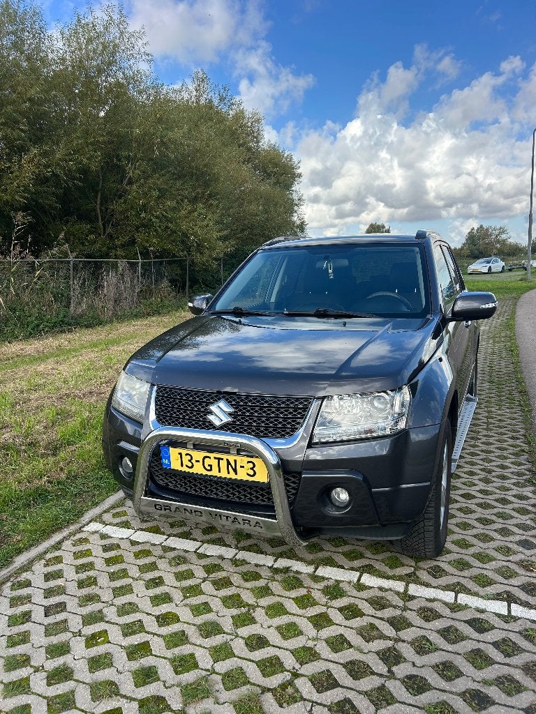 Suzuki Grand Vitara 2.4 5D 2009 Grijs, Auto's, Stof, Zwart, 4 cilinders, 1850 kg