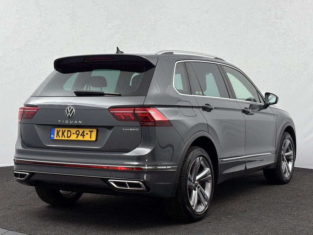 Volkswagen Tiguan 1.4 TSI 245pk DSG eHybrid R-Line Business, Auto's, Stof, 4 cilinders, Met garantie (alle), Hybride Elektrisch/Benzine