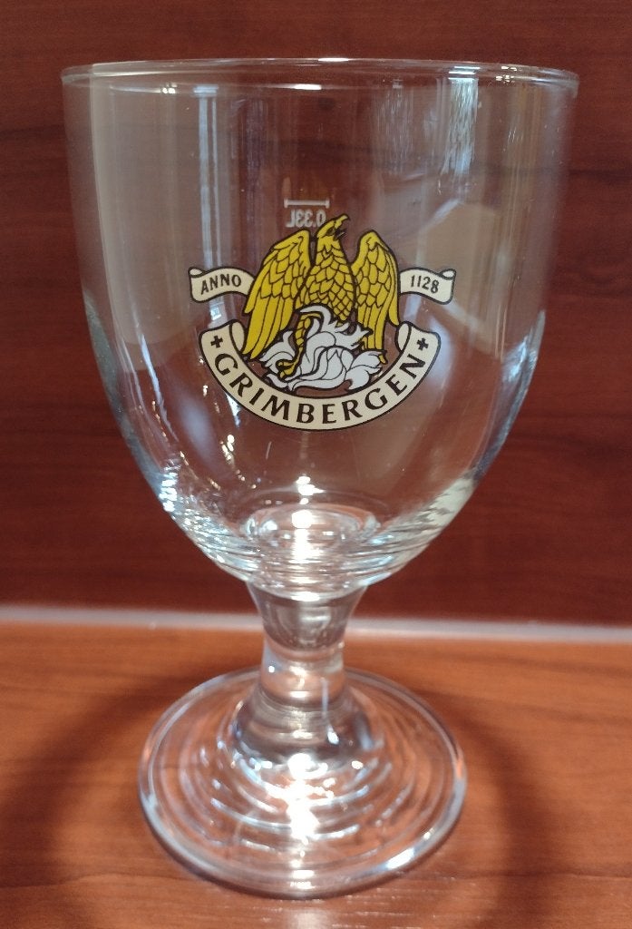 Grimbergen Glas 33cl (geel/wit logo). (A), Ophalen of Verzenden, Gebruikt, Glas of Glazen, Overige merken