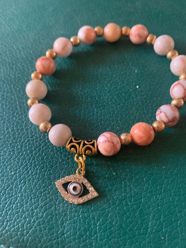 Roze kralen Armbandje met bedel., Sieraden, Tassen en Uiterlijk, Armbanden, Ophalen of Verzenden, Zo goed als nieuw, Elastiek
