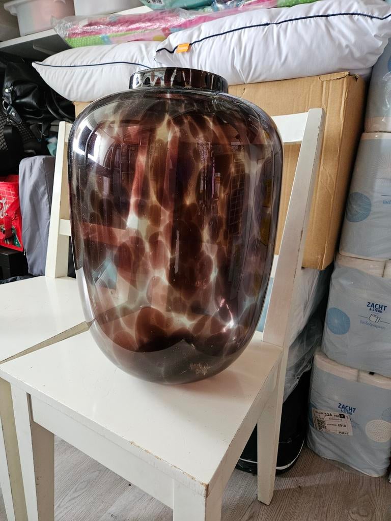 Grote glazen vaas, Ophalen