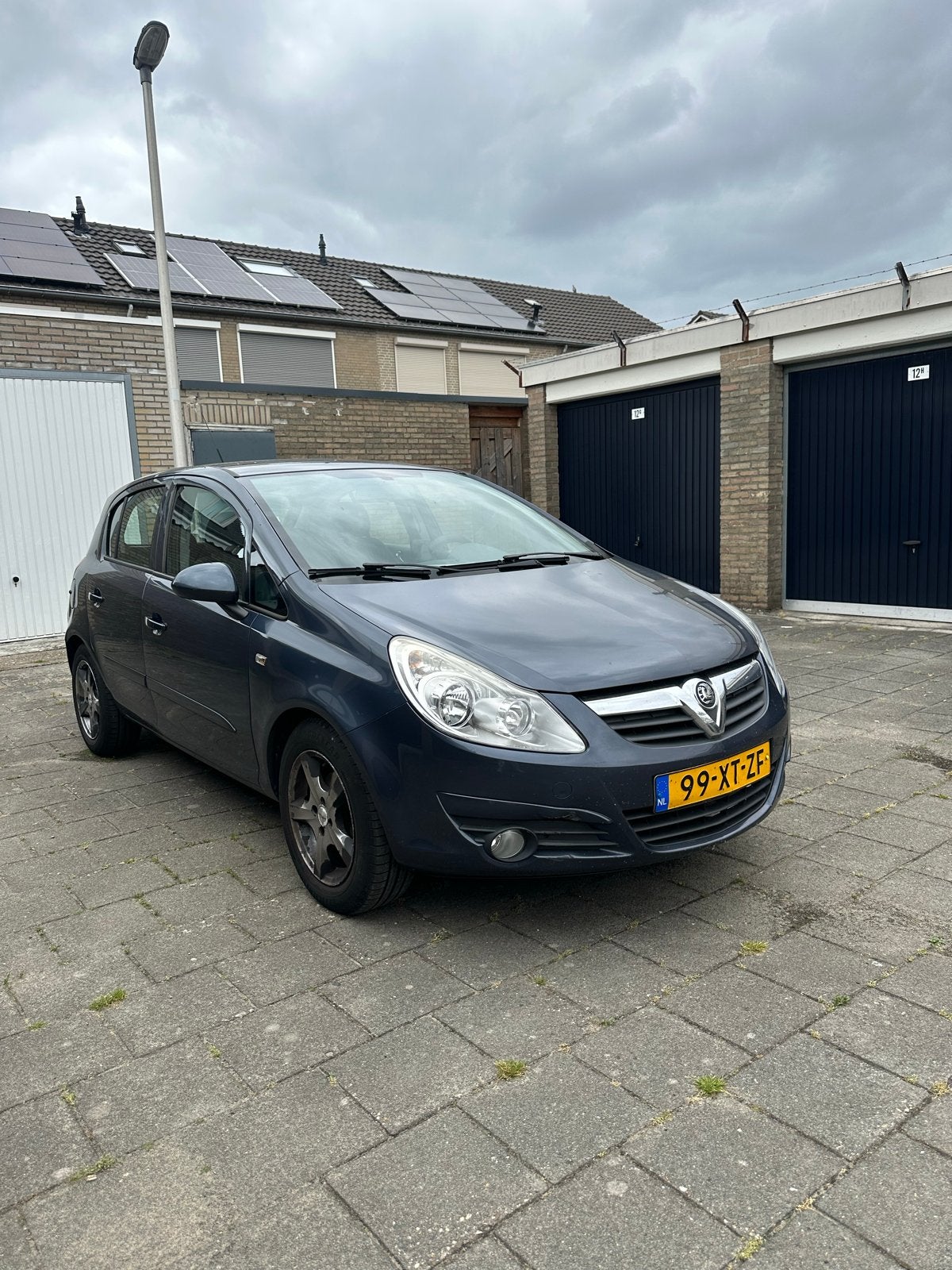 Opel Corsa 1.4 16V 5D 2007 Grijs, Auto's, Opel, Voorwielaandrijving, 4 cilinders, 49 €/maand, Origineel Nederlands