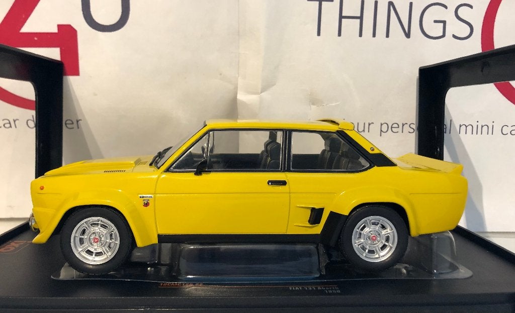 Ixo 1:18 Fiat 131 Abarth 1980 geel nieuw in verpakking, Ophalen of Verzenden, Nieuw, Auto, Overige merken