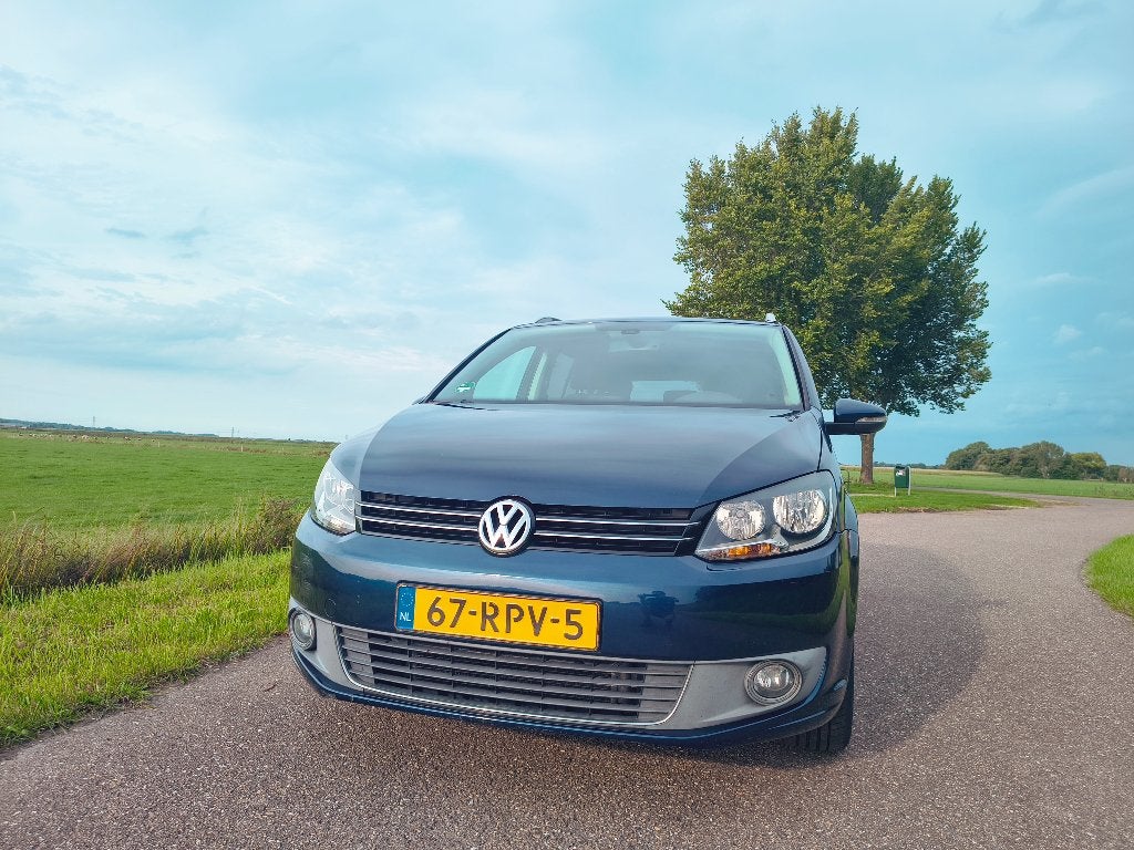 Volkswagen Touran 1.2 TSI 77KW BMT 2011 Blauw, 730 kg, 4 cilinders, Blauw, Leder en Stof