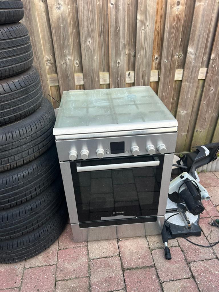 Bosch gasfornuis, Ophalen, 4 kookzones, Zo goed als nieuw, Gas