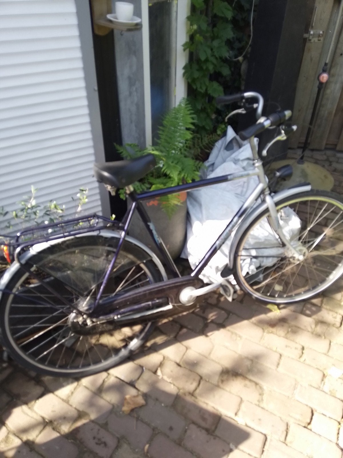 Mooie heren fiets, Ophalen