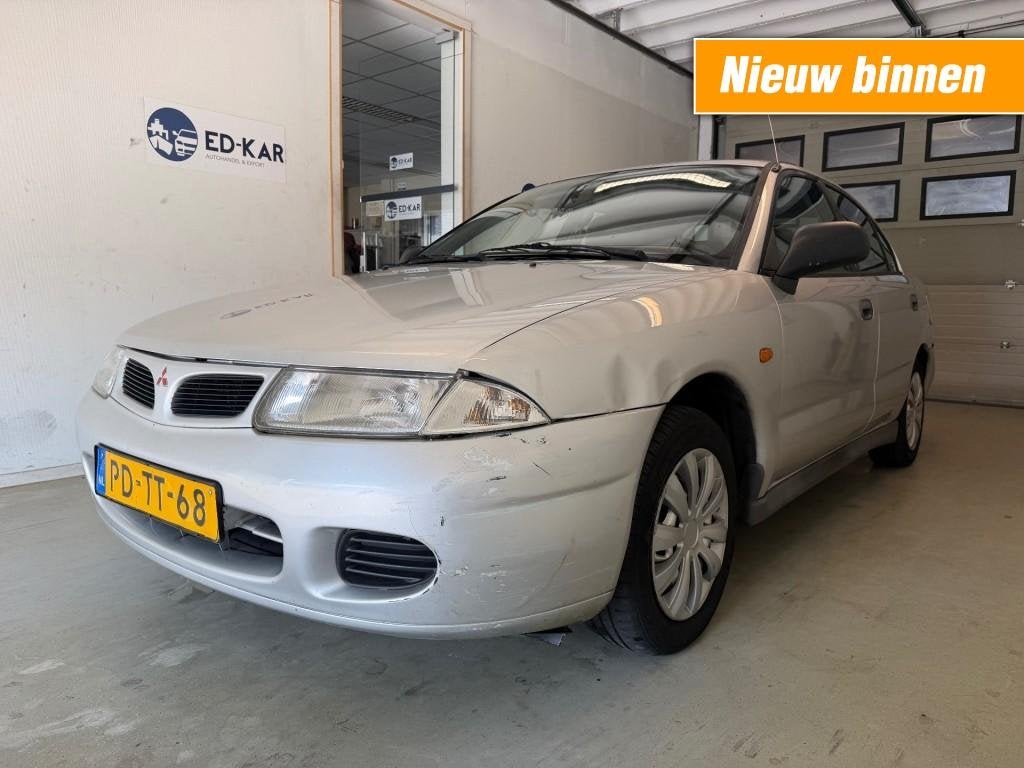 Mitsubishi CARISMA 1.6 GLX AUTOMAAT KOUDE AIRCO RIJDT GOED N, Gebruikt, 4 cilinders, 49 €/maand, Origineel Nederlands