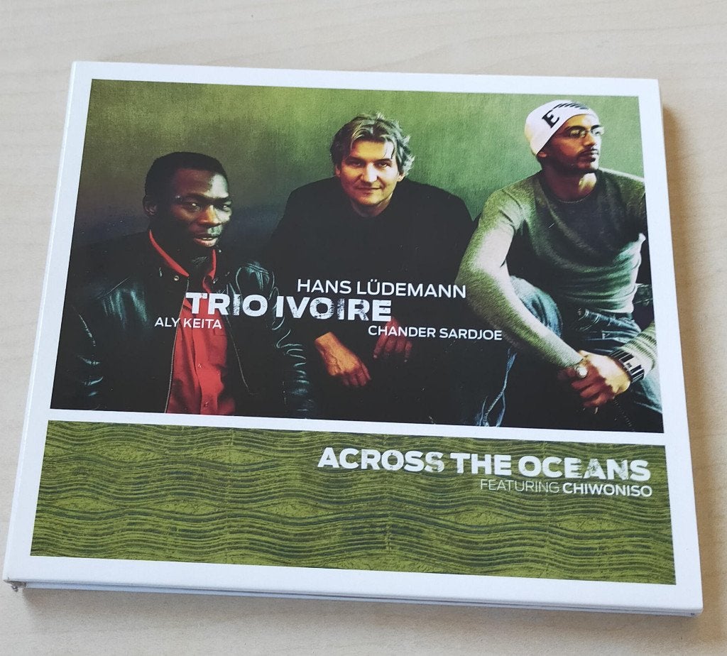 Trio Ivoire Across The Oceans CD Aly Keita Hans Ludemann, Cd's en Dvd's, Ophalen of Verzenden, Zo goed als nieuw, Jazz, Digipak