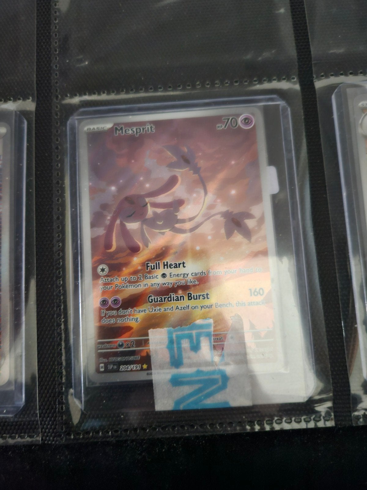 Pokemon Mesprit 204/191 Surging Sparks, Ophalen of Verzenden, Zo goed als nieuw, Losse kaart, Foil
