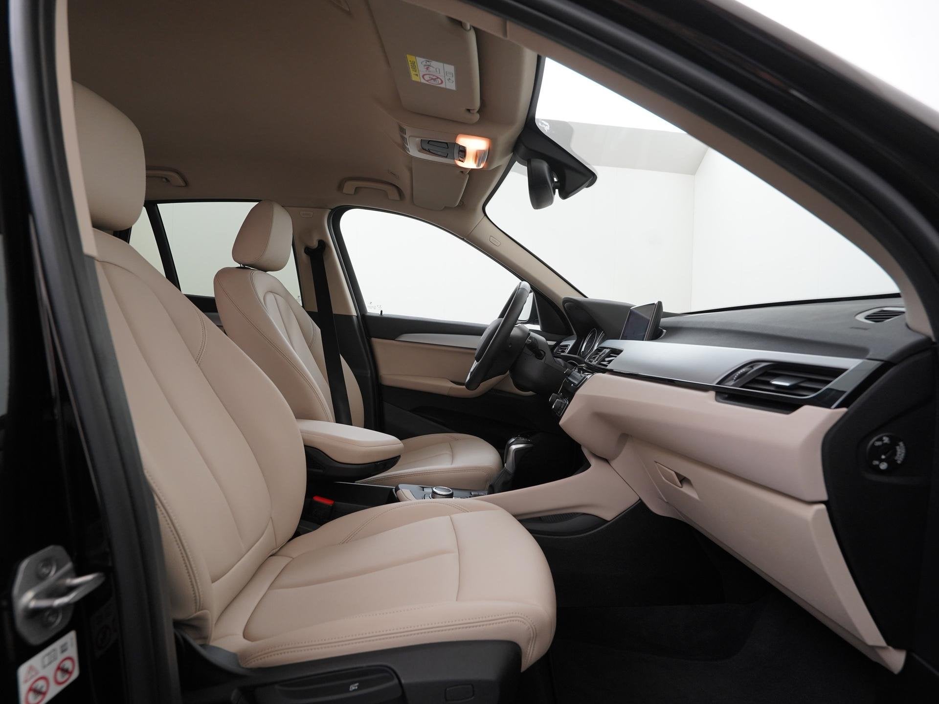 BMW X1 xDrive25e Executive | Camera | Leder | Elektr achterk, Auto's, Gebruikt, Zwart, Plug-in hybride, Vierwielaandrijving