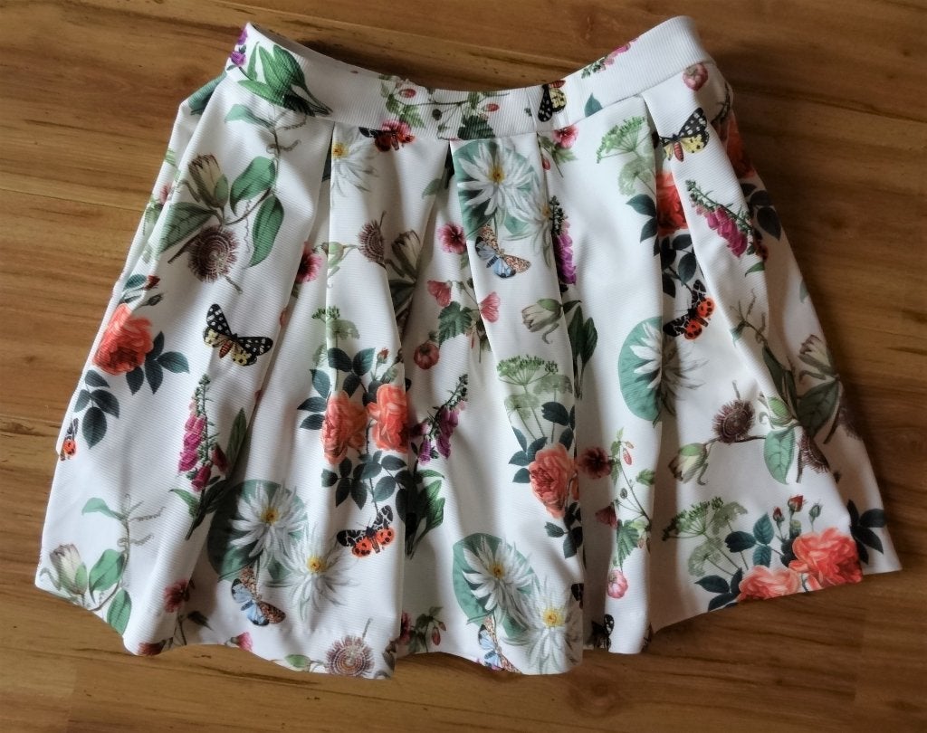 Nieuw: korte Yumi cirkelrok offwhite vlinders bloemen mt 44, Ophalen, Meerkleurig, Maat 42/44 (L), Nieuw