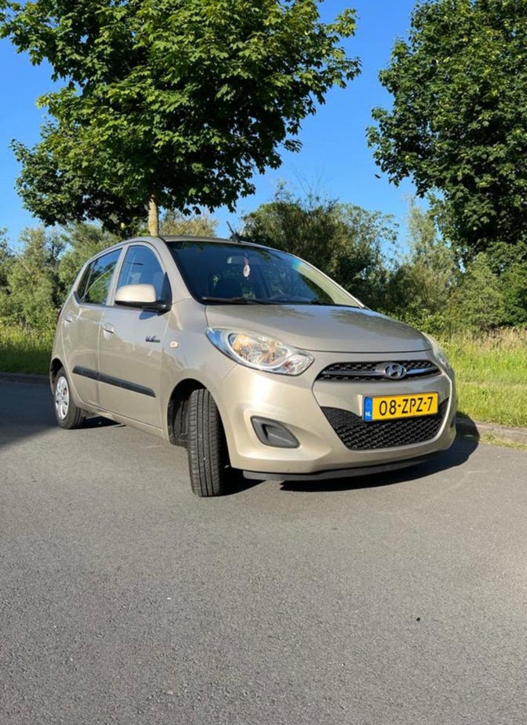 Hyundai i10 1.0 i-Drive 2013 | NAP | APK | Nieuwe banden, Auto's, Hyundai, Voorwielaandrijving, 31 €/maand, 400 kg, Beige