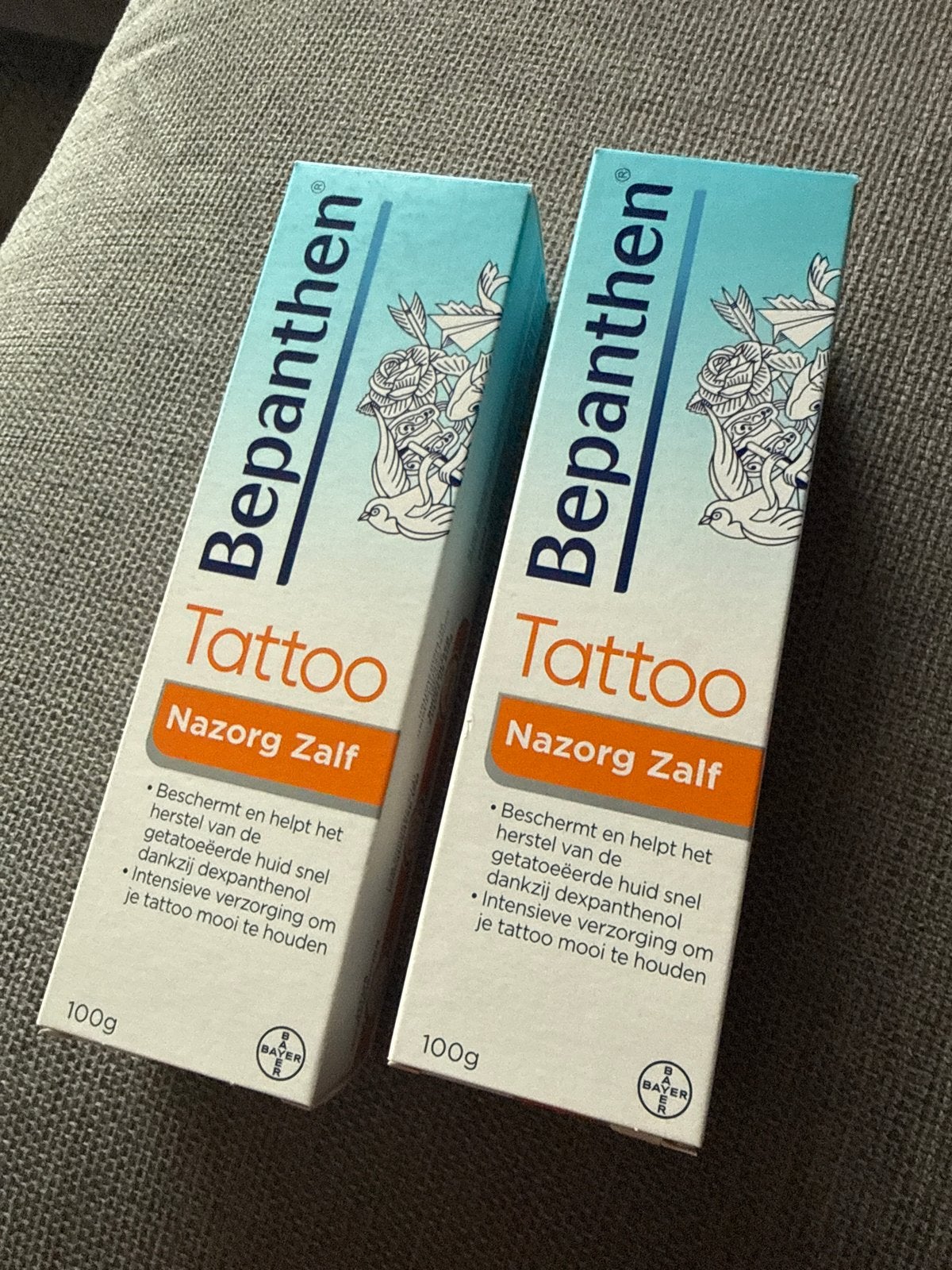 2x Bepanthen Tattoo Nazorg Zalf 100g - zeer minimal gebruikt, Sieraden, Tassen en Uiterlijk, Uiterlijk | Lichaamsverzorging, Nieuw
