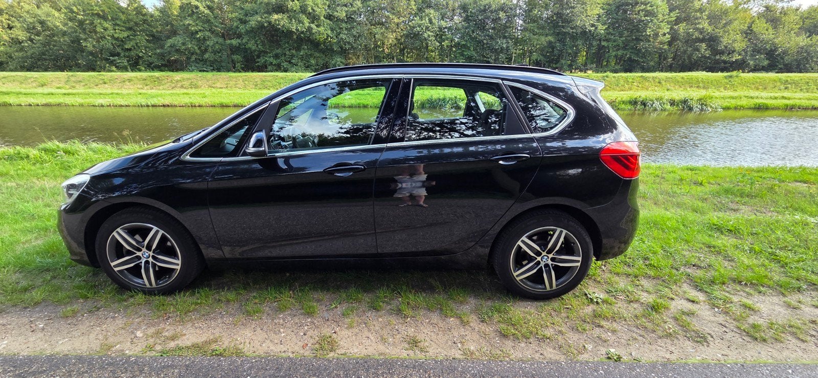 BMW 2-Serie Active Tourer 218d 150pk Aut 2015 Zwart, Auto's, 1995 cc, 4 cilinders, Zwart, Origineel Nederlands