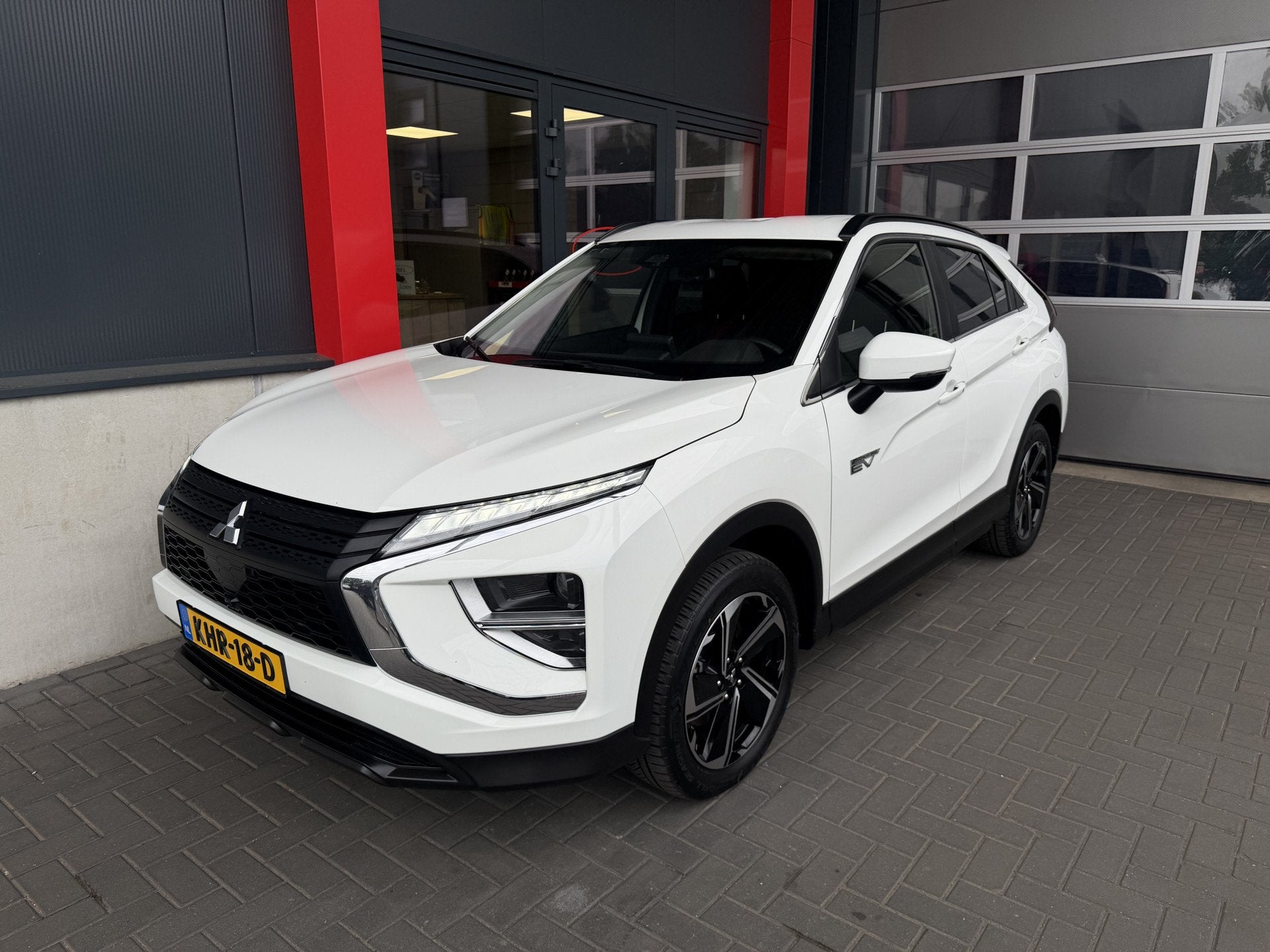 Mitsubishi Eclipse Cross 2.4 PHEV 8 Jaar fabrieksgarantie /, Auto's, Automaat, Dealer onderhouden, Stof, Wit