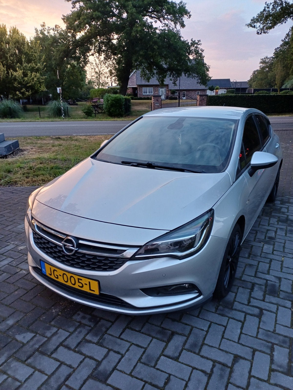 Opel Astra 1.0 Turbo 77KW 5D 2016 Grijs, Auto's, 610 kg, 23 km/l, Origineel Nederlands, Handgeschakeld