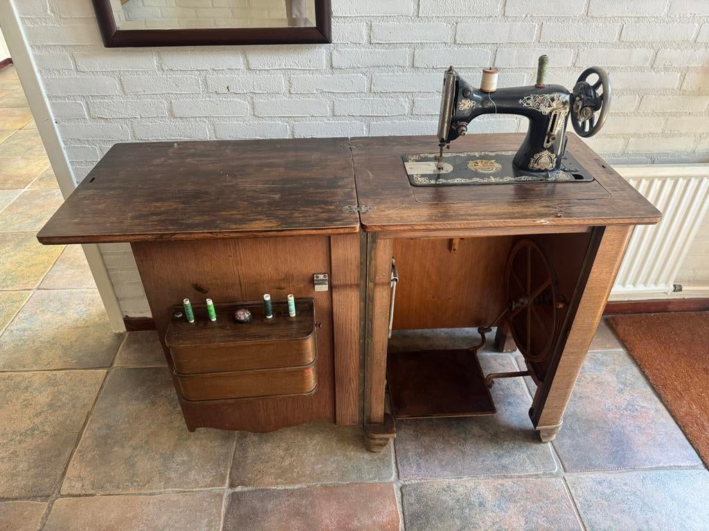 Antieke Naaimachine, Ophalen