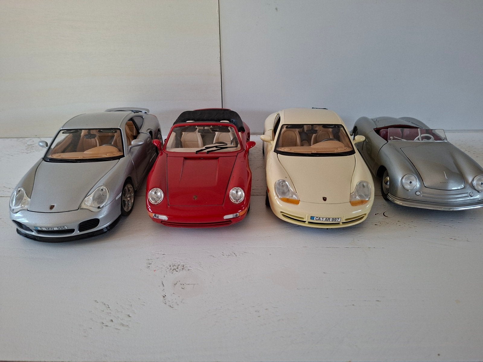Set van 4 Porsche modelauto's - Diverse modellen, Ophalen of Verzenden, Zo goed als nieuw, Auto, Overige merken