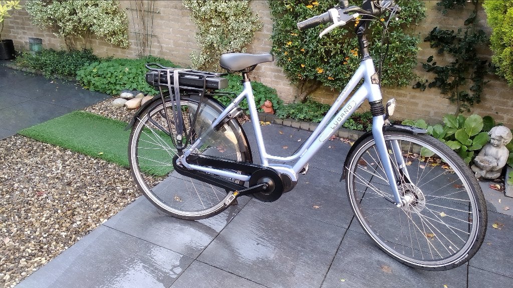 Dames e-back Lugano 28 inch 54 cm frame middenmotor, Gebruikt, 51 tot 55 cm, 50 km per accu of meer, Ophalen