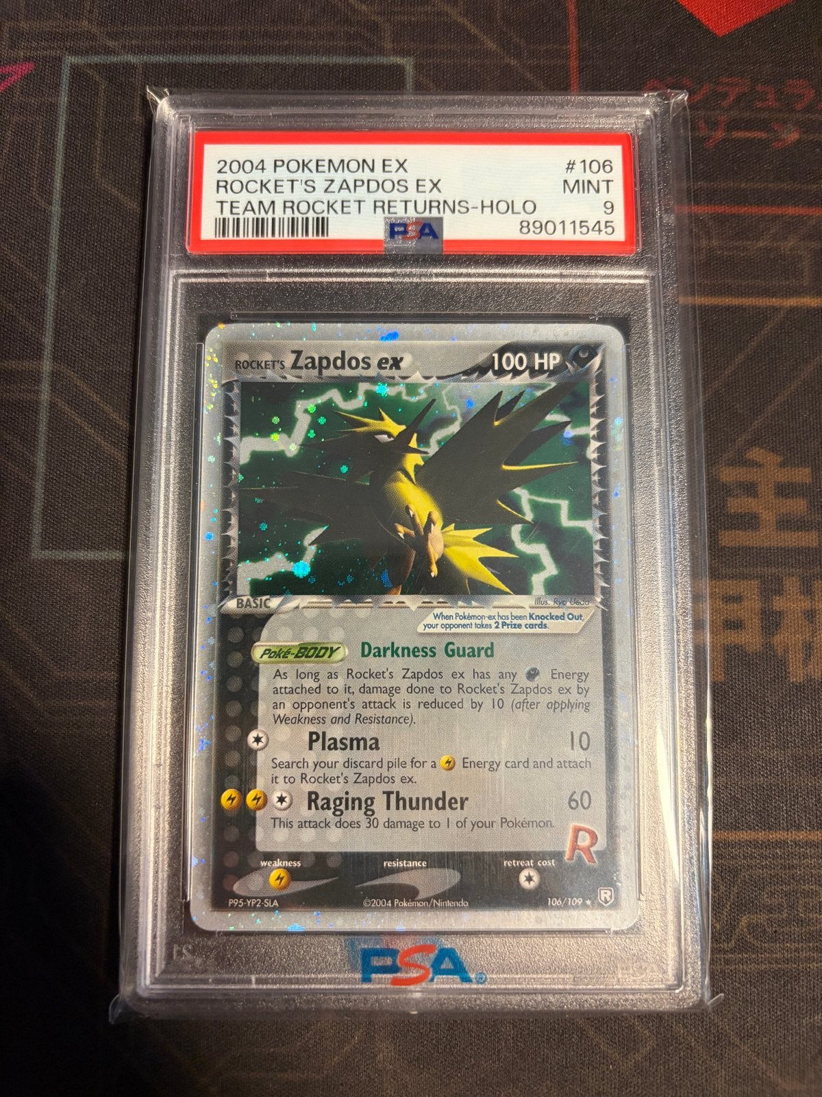 2004 Rocket's Zapdos ex Team Rocket Returns PSA 9, Ophalen of Verzenden, Zo goed als nieuw, Losse kaart, Foil