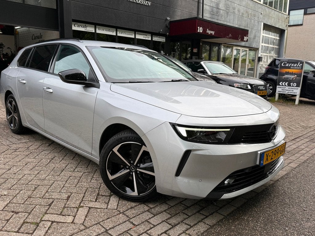 Opel Astra Sports Tourer 1.2 Level 2 distributie vernieuwd 1, Auto's, Opel, Voorwielaandrijving, Gebruikt, 1199 cc, Origineel Nederlands