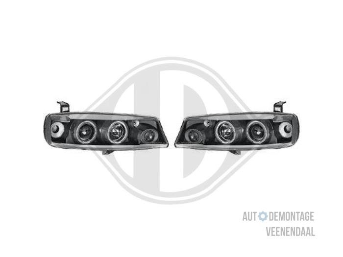 Koplampset links + rechts van een Opel Calibra, -, -, Opel, Nieuw