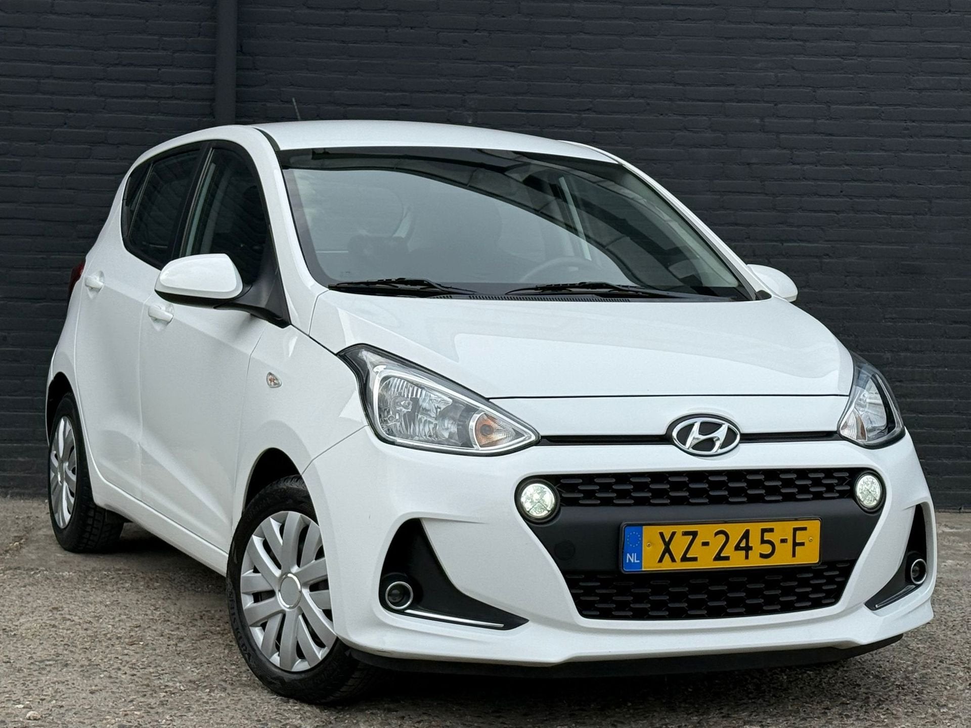 Hyundai I10 1.0i Comfort AIRCO|CRUISE|ELEK RAMEN|116940KM|NA, Auto's, Hyundai, Stof, Gebruikt, 4 stoelen, Wit