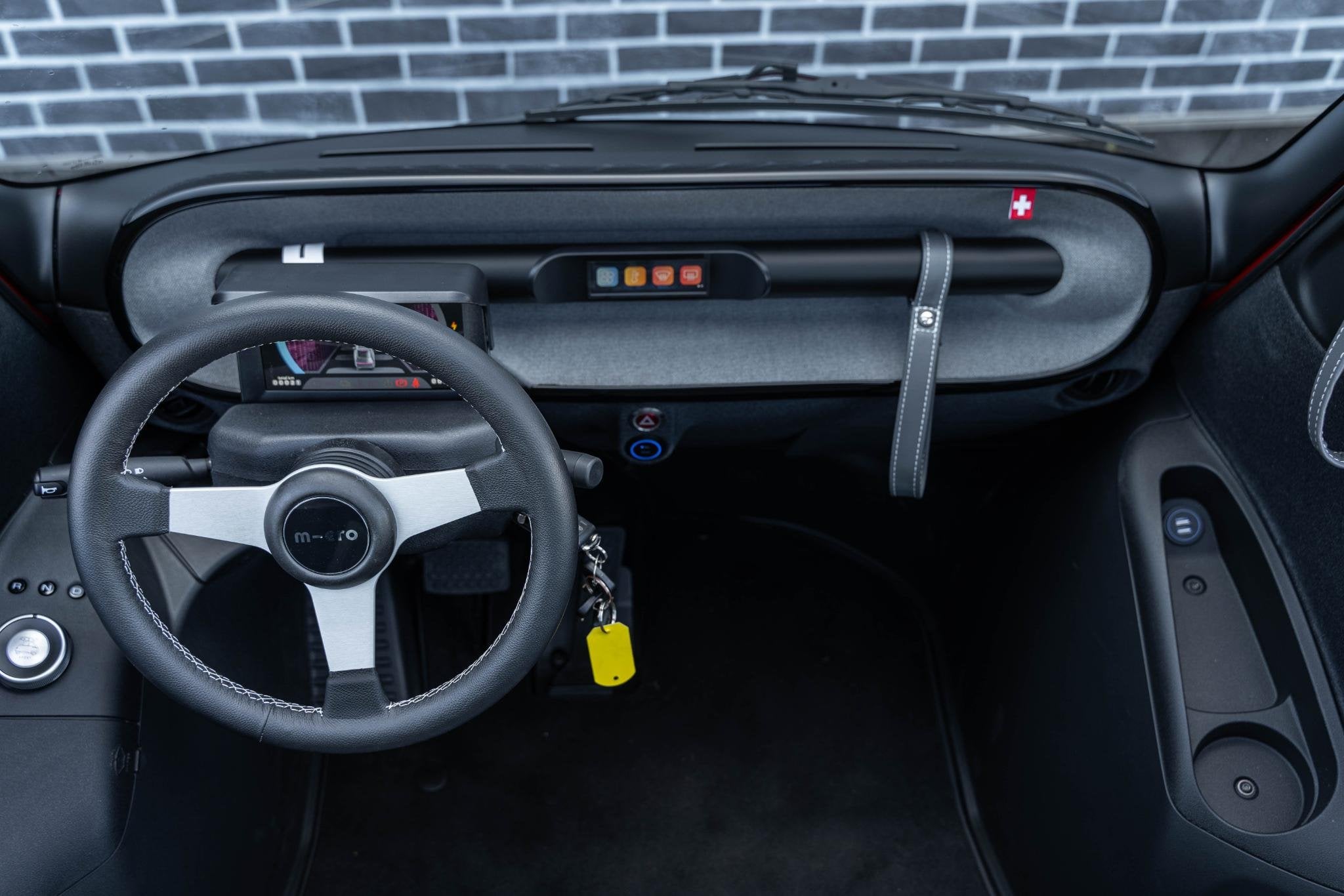 Microlino Edition 5.5 kWh | Topsnelheid 90 km/h | 90 km bere, Auto's, Overige Auto's, Gebruikt, Zwart, 335 kg, 2 stoelen